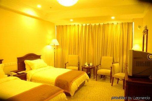 Tian Cheng Grand Hotel Rizhao Quarto foto